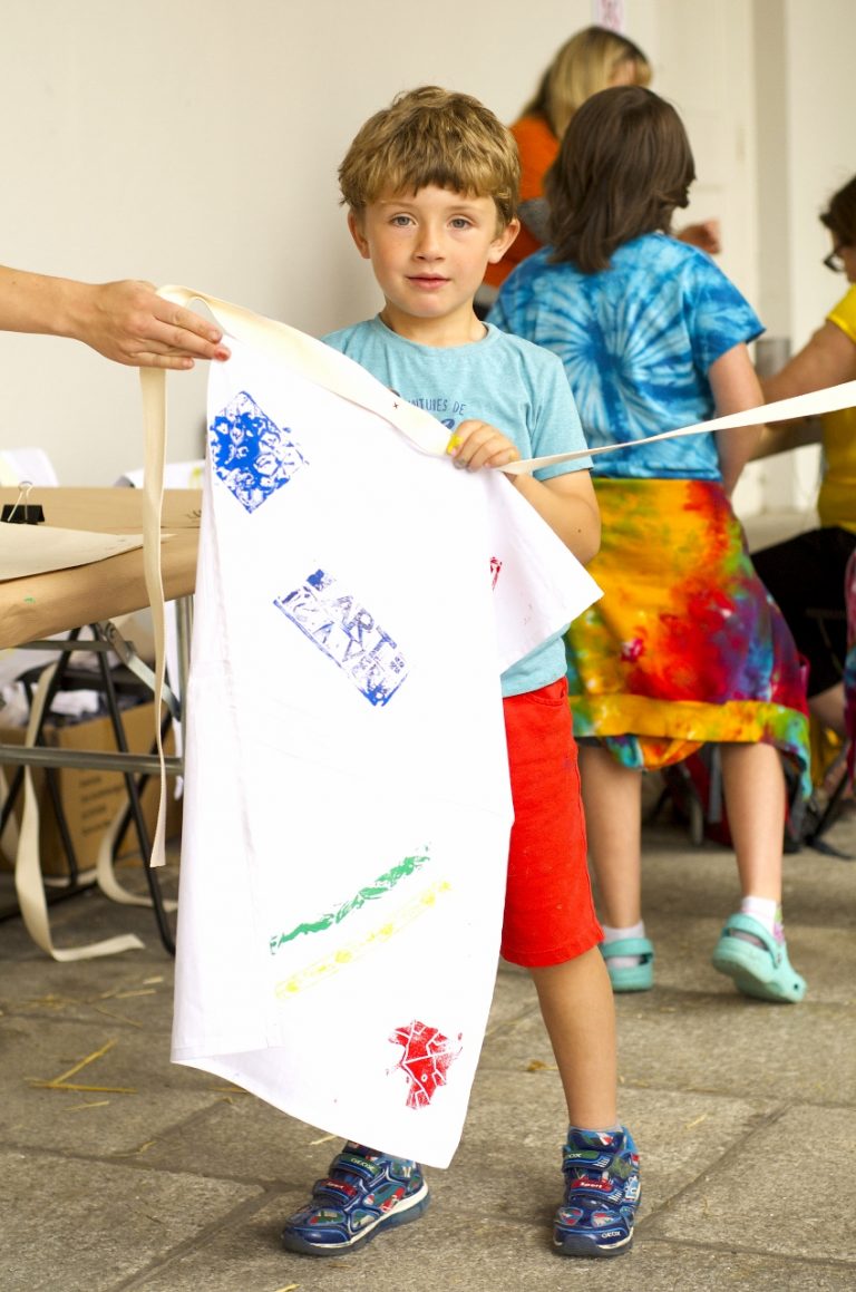 Gallery thumbnail. Child Making at A Fair Land