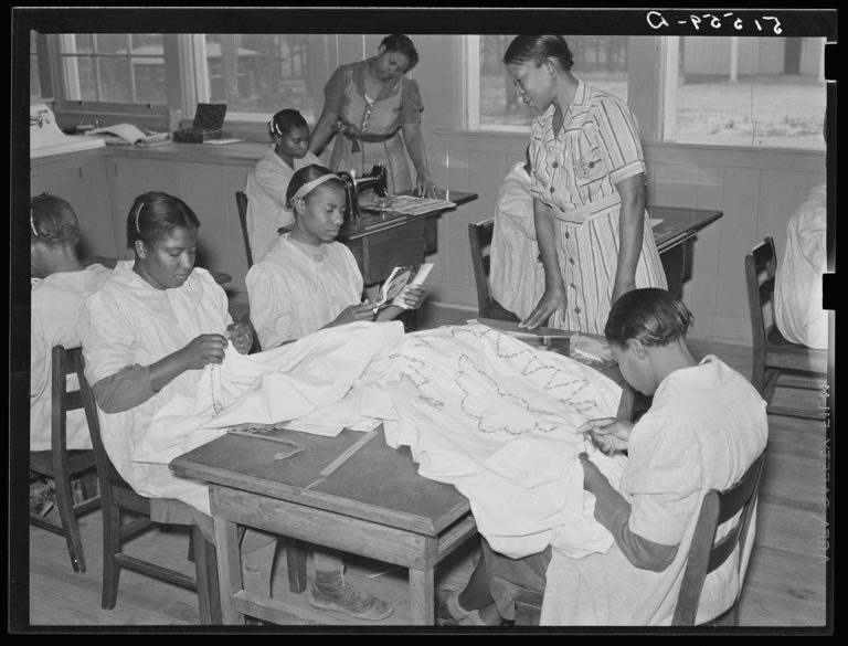 Gallery thumbnail. NYA (National Youth Administration) girls making bedspreads under supervision of Juanita Coleman, NYA leader, in school home economics room. Gee's Bend, Alabama 

Photo: Marion Post Wolcott, 1939 

Courtesy Souls Grown Deep 